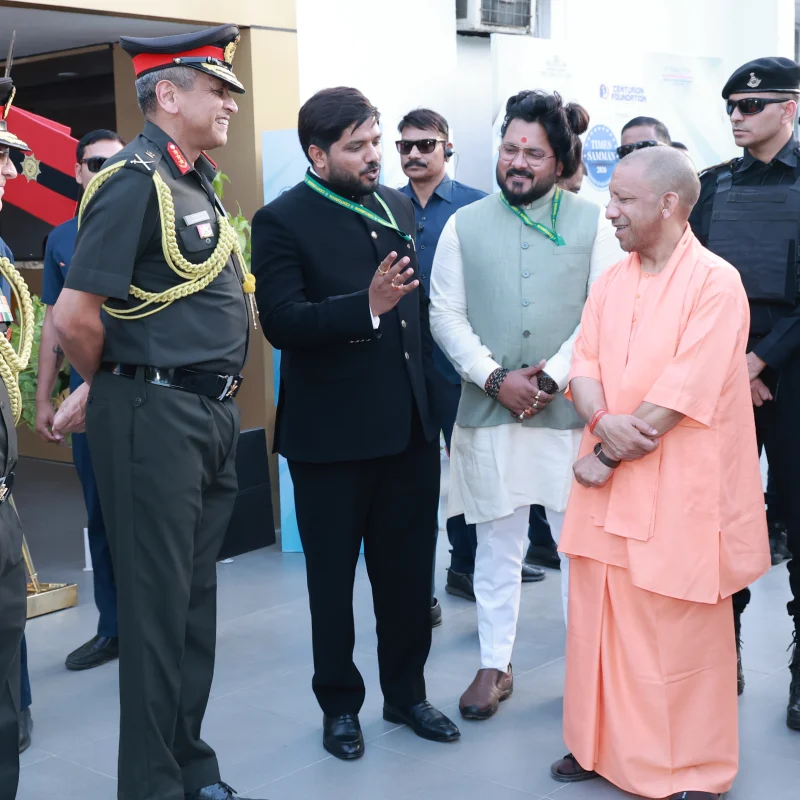 Shishir Dixit Sir, Hemant Dixit Sir, and GOC Central Command Lt Gen Anindya Sengupta interacting with CM Yogi Adityanath at Times Samman 2026.